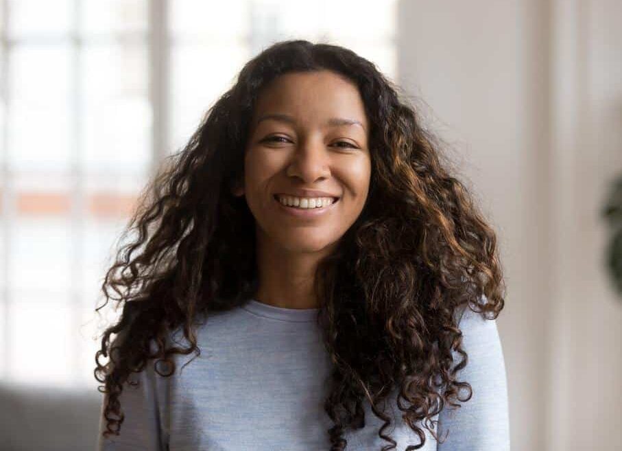 1760111378_happy-young-woman-wearing-sweater-e1668719906905 Nose Conditions in Richmond, VA