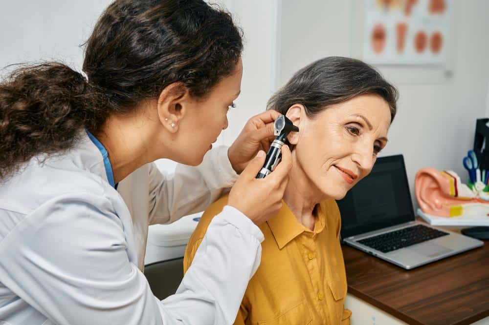 1760111639_doctor-checking-patient-ear-va-ent Hearing Care in Richmond, VA