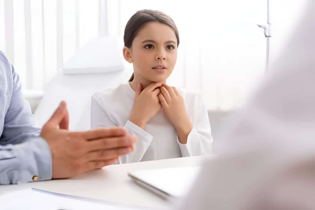 girl-neck-mass-holding-throat-virginia-ent-Picsart-AiImageEnhancer Pediatrics in Richmond, VA