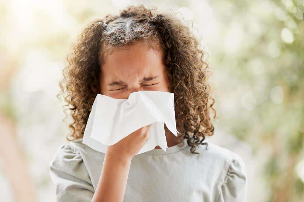 girl-with-sinus-infection-blowing-nose Pediatrics in Richmond, VA