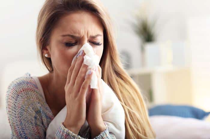 woman-with-allergies-blowing-nose Allergy Treatment in Richmond, VA